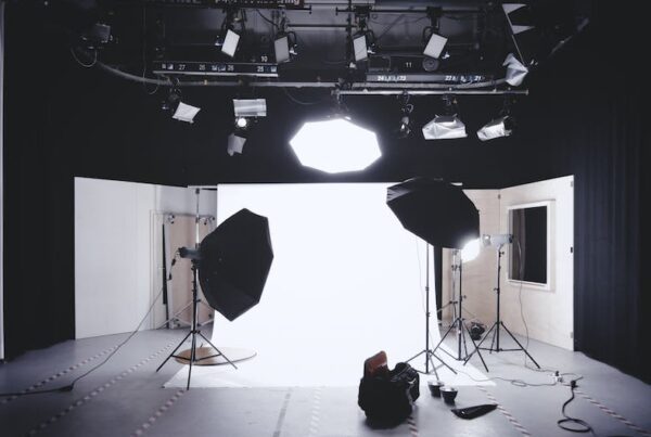 in the studio, on the set of a corporate photography project with lights set-up and no crew