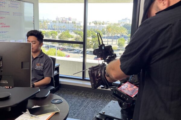 Filming employee in office at County of Orange